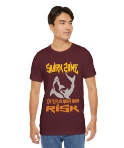 Shark Zone: Enter at Your Own Risk Diving T-Shirt – A bold maroon t-shirt featuring a fierce shark graphic and edgy text design. Perfect for ocean lovers and thrill-seeking divers