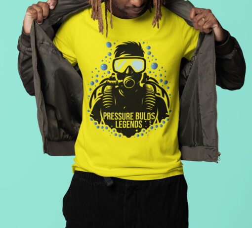 Pressure Builds Legends Diving T-Shirt featuring a bold diver silhouette surrounded by bubbles, symbolizing strength and resilience under pressure, perfect for fearless diving enthusiasts.