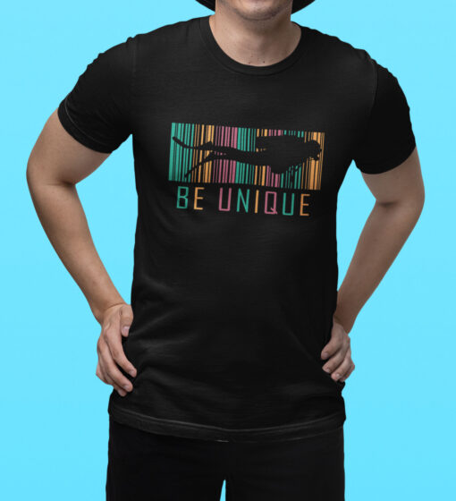 Be Unique Diving T-Shirt featuring a vibrant diver silhouette and colorful ocean-inspired stripes, perfect for diving enthusiasts and adventure seekers.