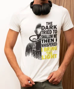 The Dark Scuba Diving T-Shirt featuring a diver silhouette in shadow and light. Premium scuba diving apparel with inspirational ocean quote for enthusiasts.