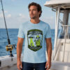 Funny alien fishing shirt with vintage UFO badge design on heather ice blue crew neck tee for anglers