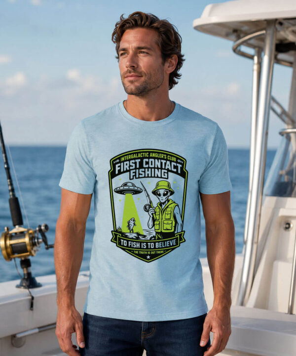 Funny alien fishing shirt with vintage UFO badge design on heather ice blue crew neck tee for anglers