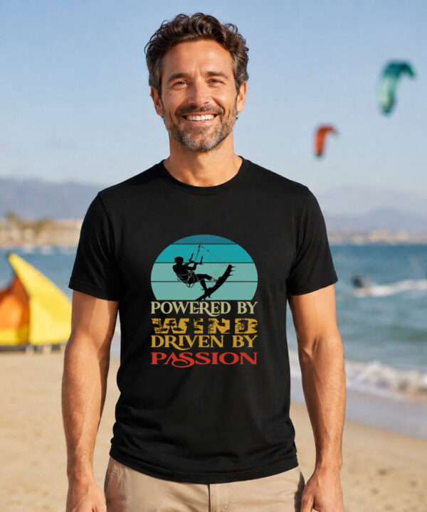 Kitesurfer shirt with vintage badge graphic reading Powered By Wind Driven By Passion, black tee, Seasportees